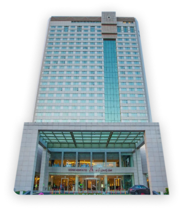 View of Azadi Hotel, showcasing its modern architecture and mountain backdrop