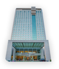 View of Azadi Hotel, showcasing its modern architecture and mountain backdrop