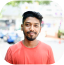 A man with orange shirt